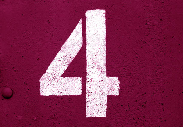 istock Number 4 in stencil on metal wall in pink tone. 1132310210