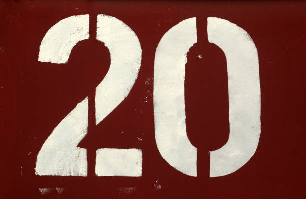 istock Number 20 in stencil on red metal wall. 1132310295