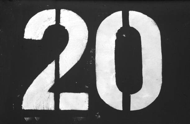 istock Number 20 in stencil on metal wall in black and white. 1132310585