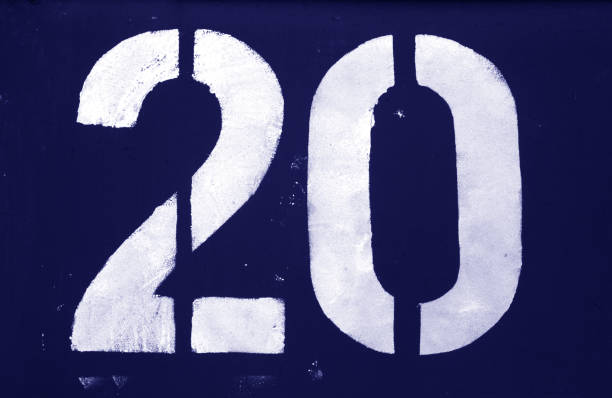 istock Number 20 in stencil on metal wall in blue tone. 1132310884