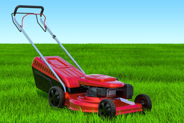istock Lawn mower in the green grass against blue sky, 3D rendering 1132311351