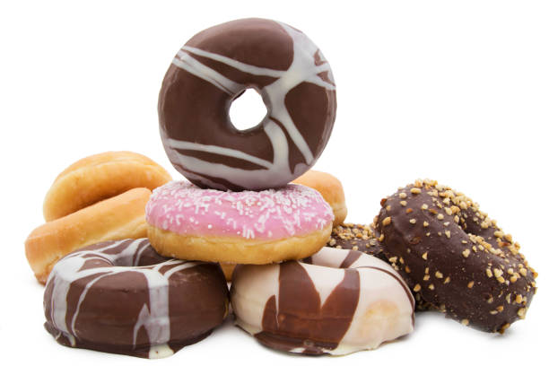 istock varied donuts stacked and insulated in white background 1132312972