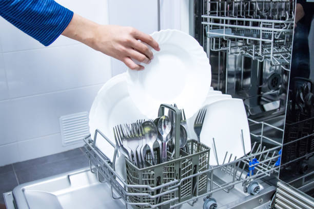 dishwasher open with clean dishes - domestic kitchen contemporary domestic room lifestyles imagens e fotografias de stock