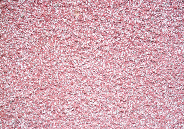 istock New rough mosaic with red and white pebbles closeup 1132316170