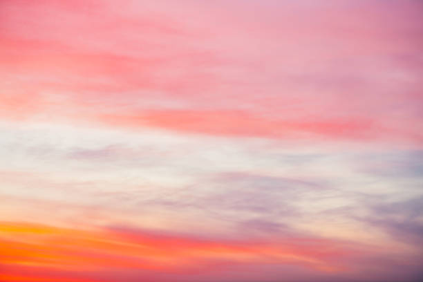 istock Sunset sky with pink orange light clouds. Colorful smooth blue sky gradient. Natural background of sunrise. Amazing heaven at morning. Slightly cloudy evening atmosphere. Wonderful weather on dawn. 1132317189