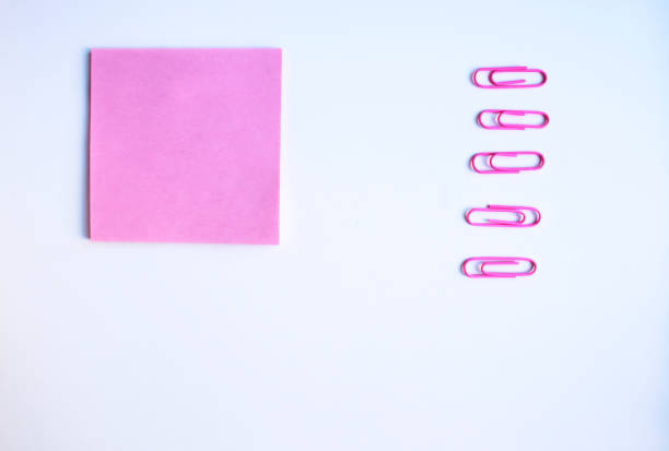 istock Pink paper and clips 1132318744