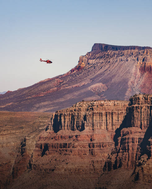 helicopter flying over grand canyon west rim - arizona, usa - canyon majestic grand canyon helicopter imagens e fotografias de stock