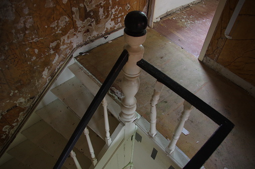 Low angle view of wooden stairs and railings as an old-fashioned background