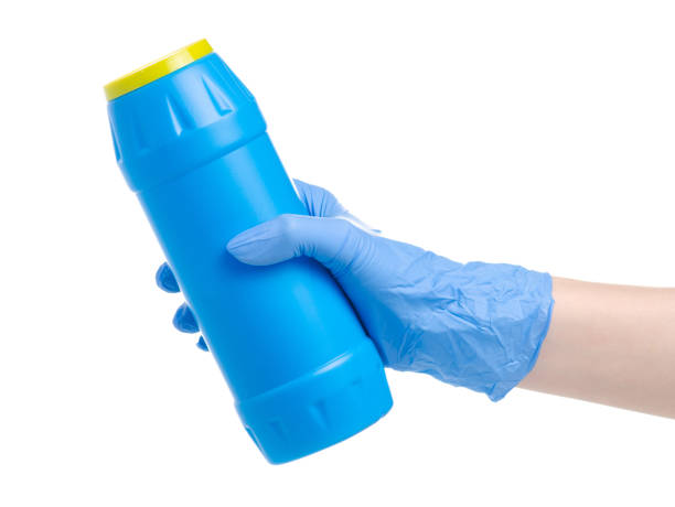 istock Blue bottle detergent powder in cleaning glove hand 1132320582