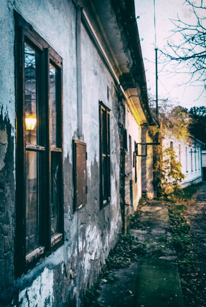 istock Old abandoned house in the evening light, analog filter 1132321834