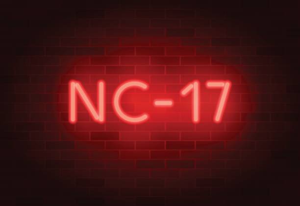 istock NC-17 rating sign. Vector neon sign on brick illuminated wall 1132321877