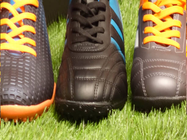 istock ball shoes on artificial turf 1132322040