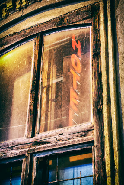 istock Window with reflective inscription Hotel, analog filter 1132323013