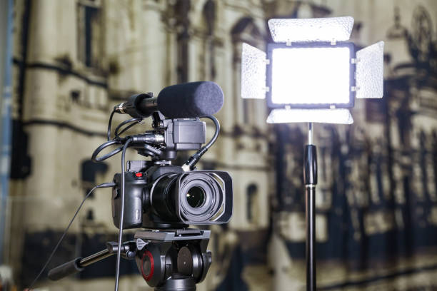 istock Shooting a report in the interior. Video equipment: camera, on-camera microphone gun, led lighting device, tripod 1132323441