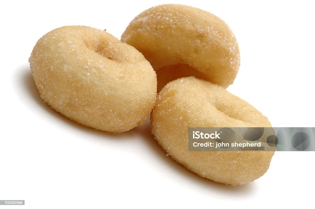 isolated frosted mini doughnuts against white isolated frosted mini doughnuts Color Image Stock Photo