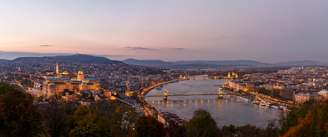Panoramic view of Budapest with Szechenyi Chain Bridge, Matthias Church and Hungarian Parliament Building at dusk