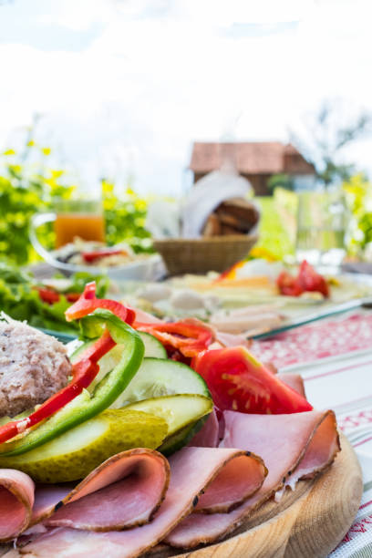 istock Brettljause, cold plate with meal on wooden table in vineyard 1132323739
