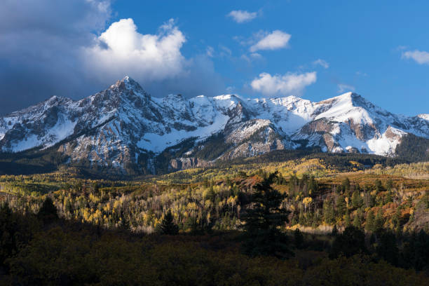 istock Mount Sneffels is within the Uncompahgre National Forest. An early fall snowstorm covers the peaks. 1132324028