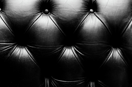 abstract background aged leather couch skin black & white
