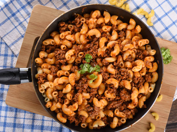 istock Top .view. Pasta with ground beef and tomato paste in a pan 1132326324