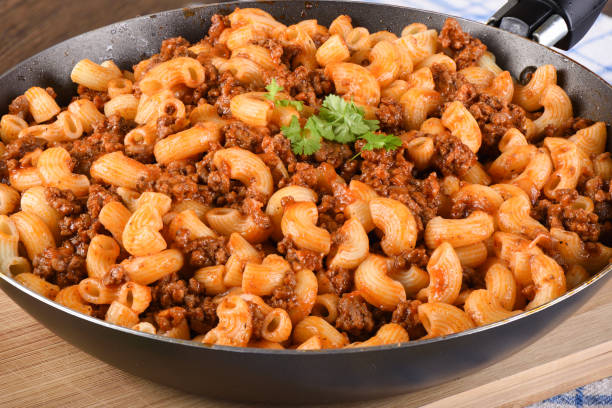 istock Pasta with ground beef and tomato paste in a pan. 1132326374