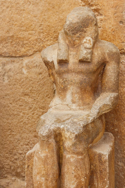istock Old statue near pyramid temple in Giza, Cairo, Egypt 1132327437