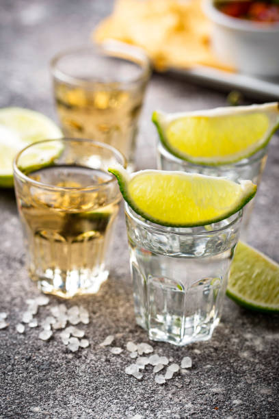 istock Shots of silver and gold tequila 1132328049