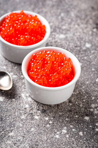 istock Two bowls with red salmon caviar 1132328274