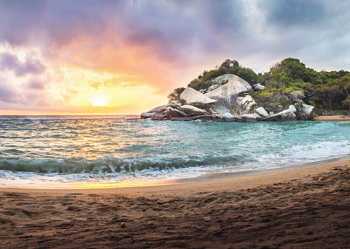 Tropical Beach at Sunrise en Cape San Juan-Parque Nacional Tayrona, Colombia photo