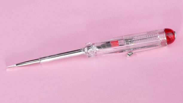istock electric indicating screwdriver on pink background 1132329348