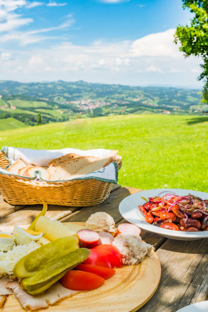 istock Brettljause with view over meadow to south styrian wine route 1132331359
