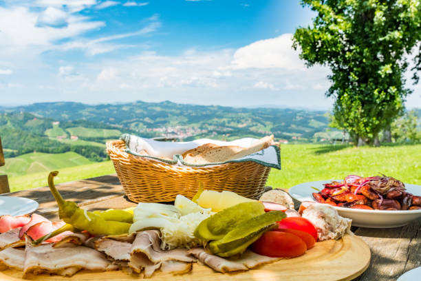istock Brettljause with view over meadow to south styrian wine route 1132331365
