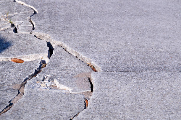 istock detail of cracked cement sidewalk 1132331837