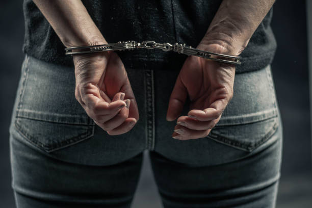 istock women handcuffed in criminal concept 1132332503
