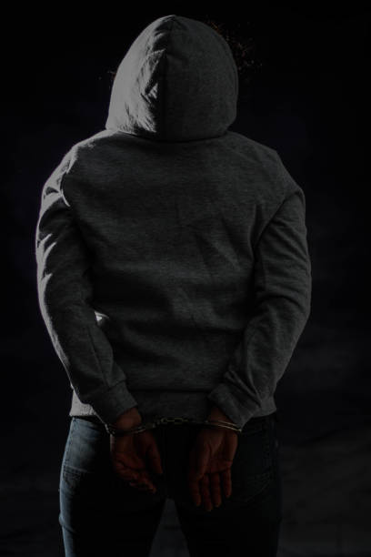 istock women handcuffed in criminal concept 1132332599