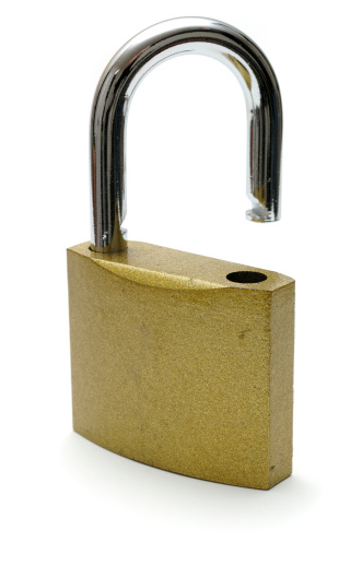 isolated padlock opened against white