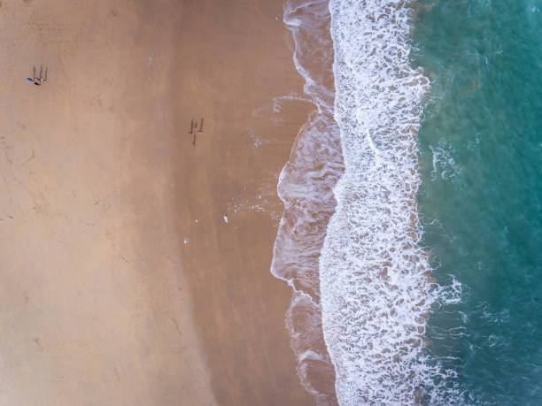 Overhead Aerial view of Waves on a beach