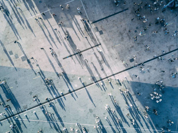istock High Angle View Of People On Street 1132336661