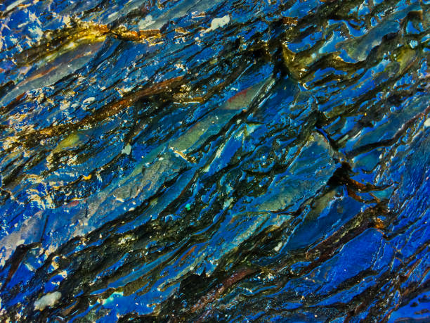 istock wet rock, stone formations as a background 1132338620