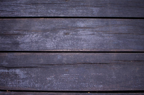 istock cut wood and wooden structure 1132338900