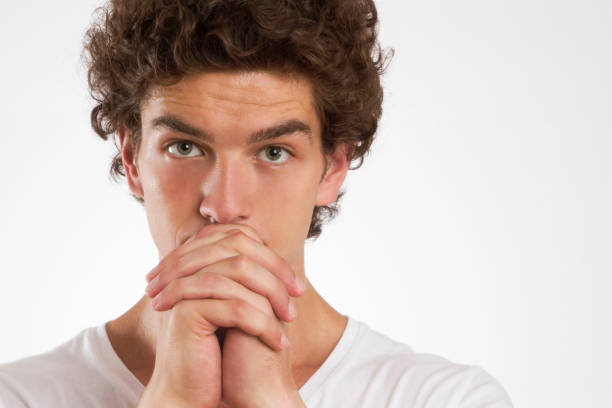 istock Nervous Young Man is Looking at Camera 1132339470