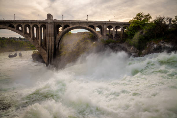 The Spokane river in spring flood near downtown Spokane, Washington