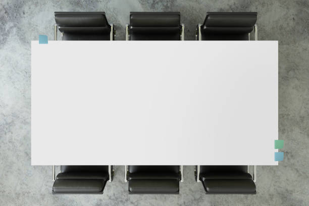 istock Top view of a clean blank table top with chairs around 1132339825