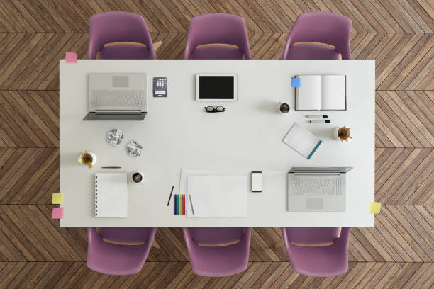 istock Top view at large team office desk 1132340232