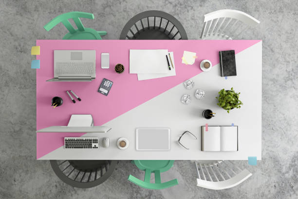 istock Top view at large team office desk 1132340285