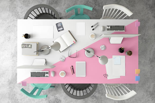 istock Top view at large team office desk 1132340313