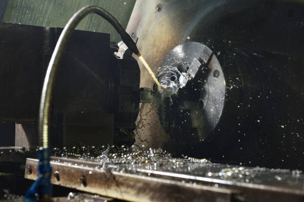 istock Spindle chuck and installed metal part in pocessing on high precision Cnc industrial lathe turning machine. CNC machine cuts off excess edges on metal part 1132342002