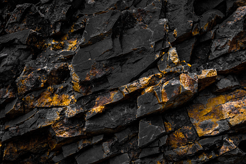 black rock background with golden / yellow color -