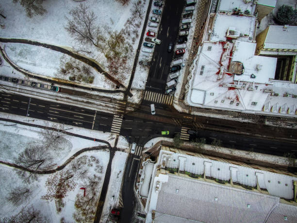 Prague winter drone top down crossroads snow