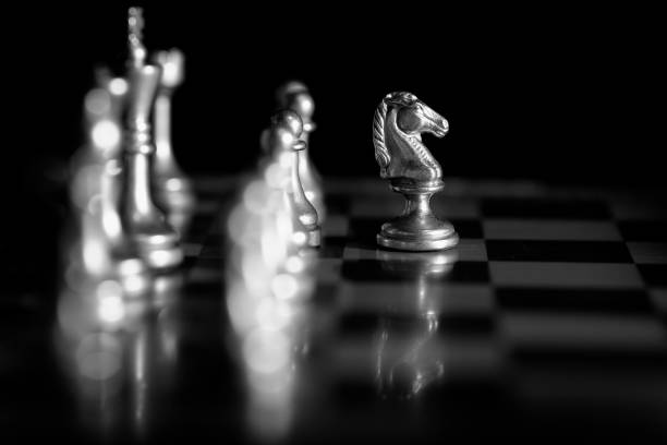istock Pieces on chess board for playing game and strategy knight kingdom gaming 1132346666